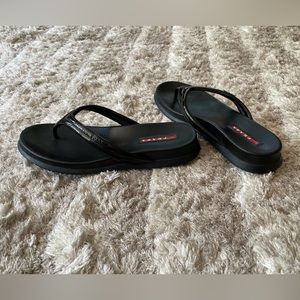 Prada patent leather flip flops